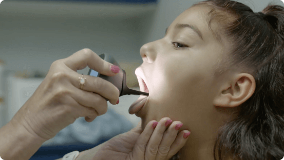 throat exam on patient