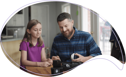 Father and daughter using Home Smart Clinic