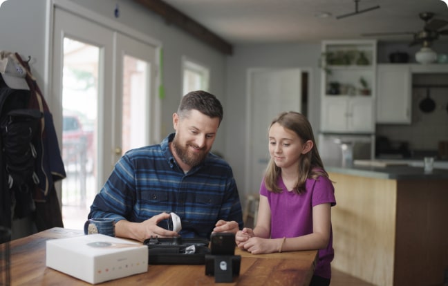 Father and child using Tyto